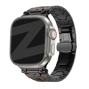 Metal Grain Strap 'Deluxe', black/orange, on a watch, 3/4 front view
