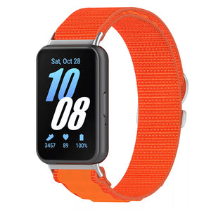 Alpine Nylon Strap, orange, on a watch, 3/4 front view