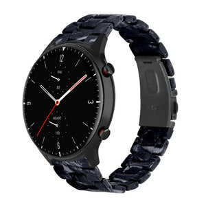 Metal Resin Strap, black/white, on a watch, 3/4 front view