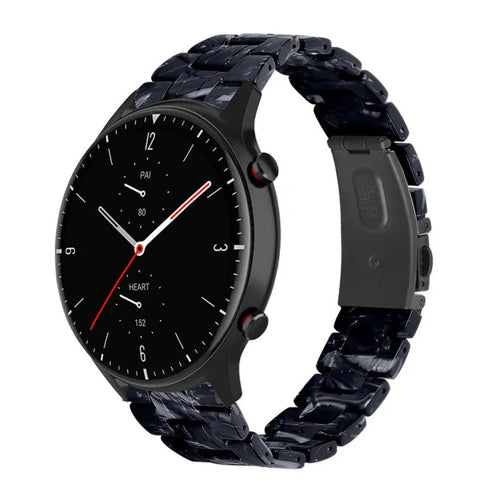 Metal Resin Strap, black/white, on a watch, 3/4 front view
