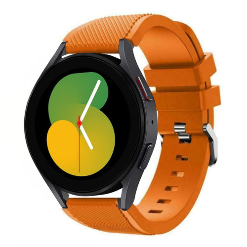Twill Silicone Strap, orange, on a watch, 3/4 front view