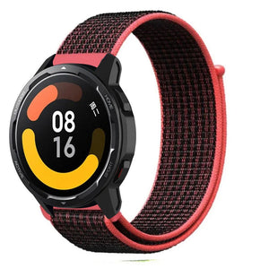 Nylon Strap, black/coral, on a watch, 3/4 front view