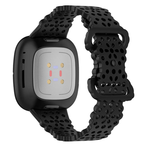 Patterned Silicone Strap, black, on a watch, 3/4 rear view