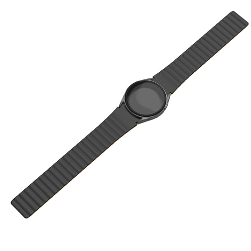 Magnetic Silicone Strap, black/orange, on a watch, direct front view